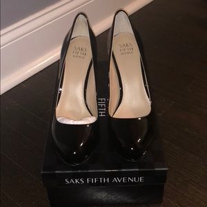 Black patent leather pumps